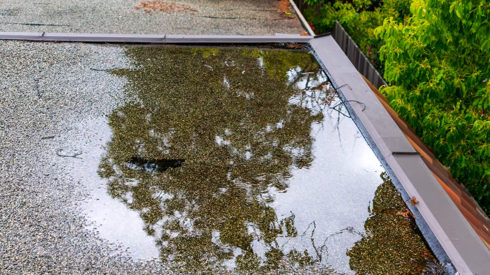 Ponding standing water on commercial roof