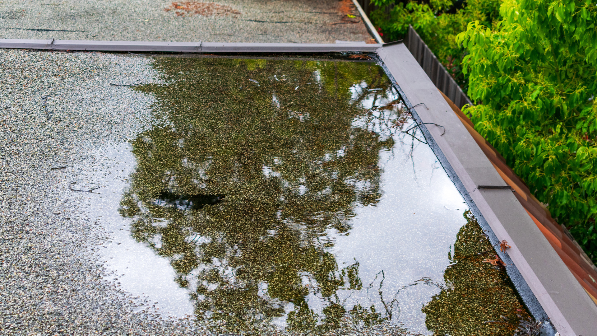 Ponding standing water on commercial roof