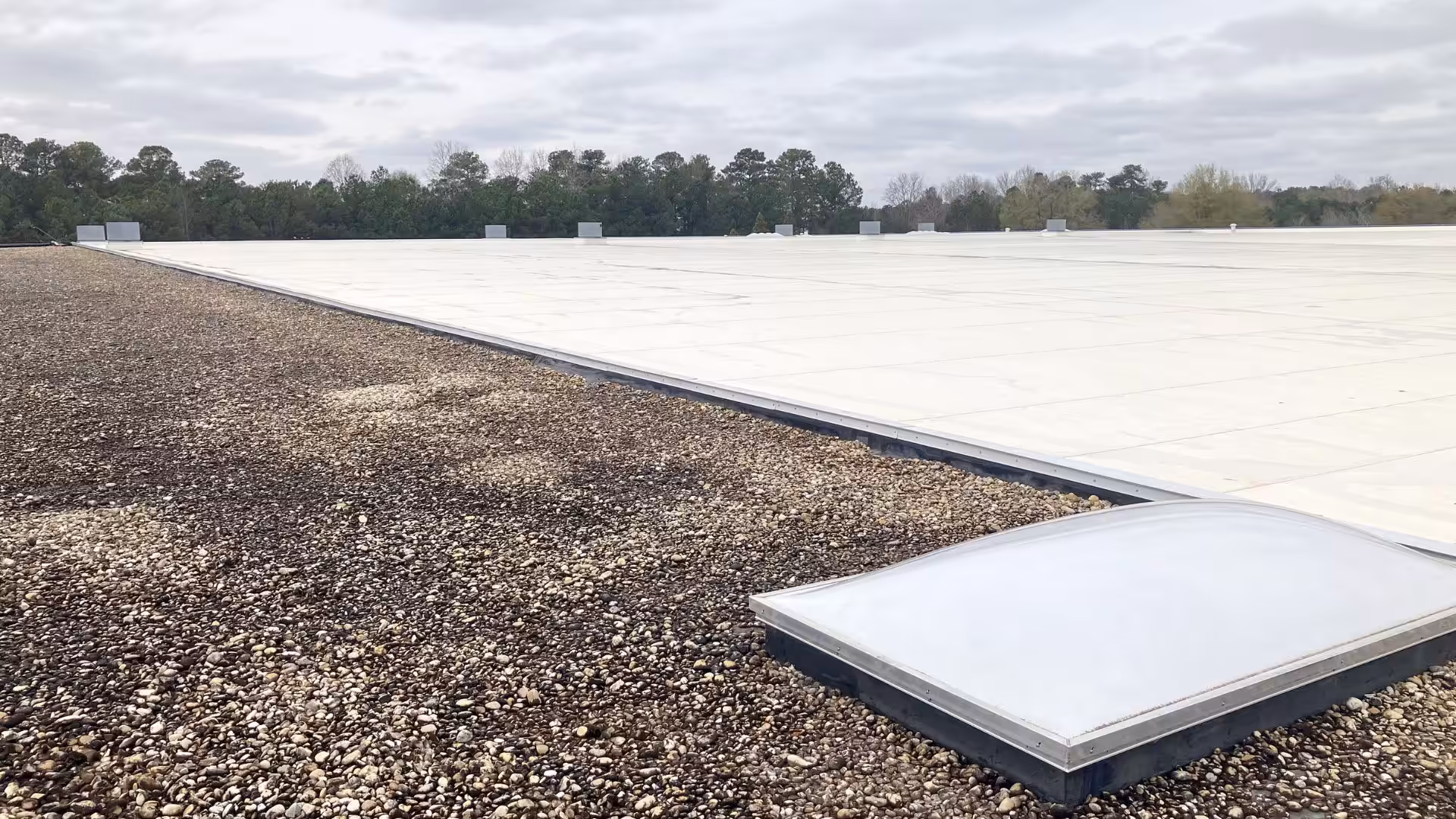 Commercial skylight repair by MBA Roofing.